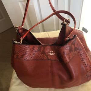 Coach shoulder strap ( brick color)